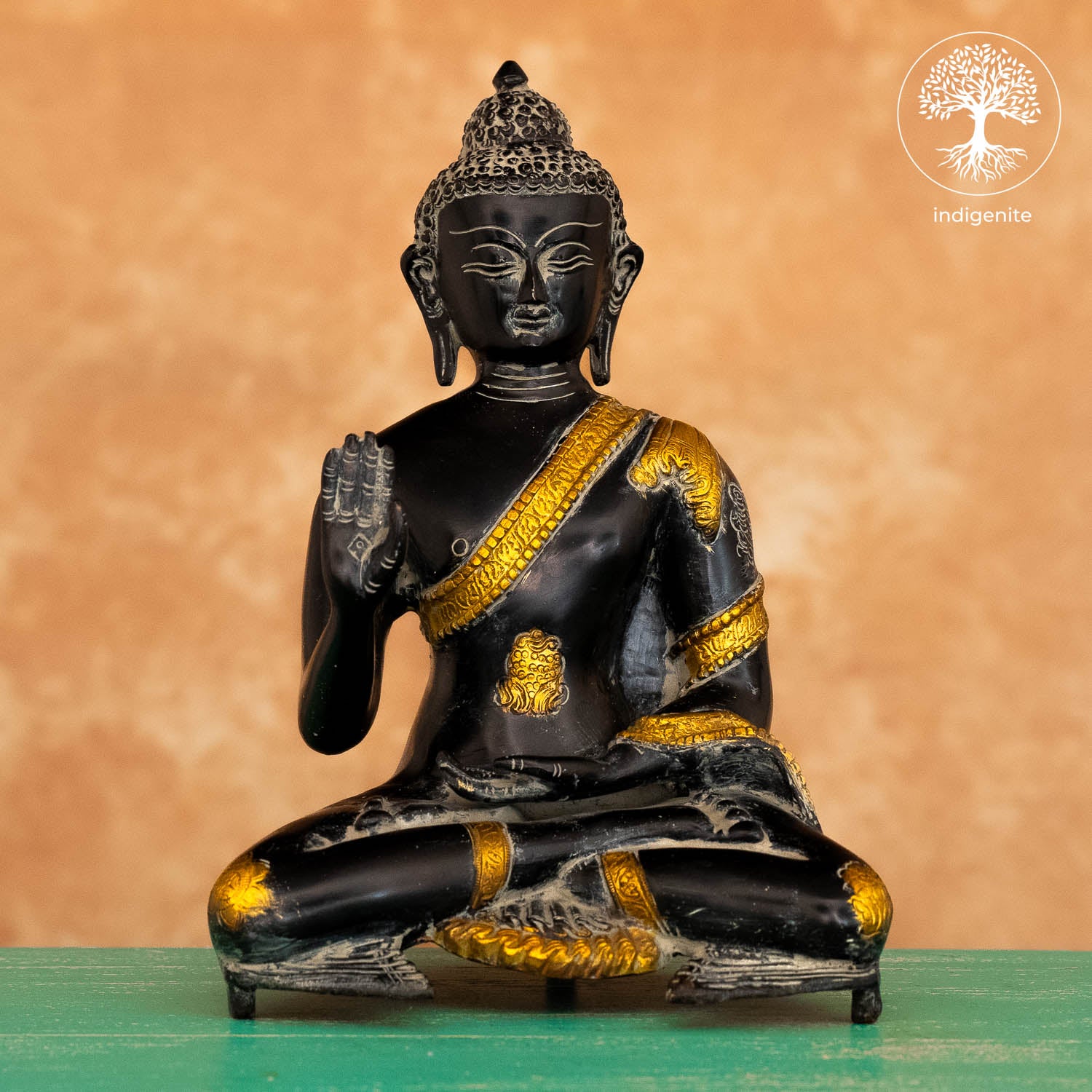 Antique Lord Buddha Sitting In Abhaya Mudra - Brass Statue in Black and Gold Hues
