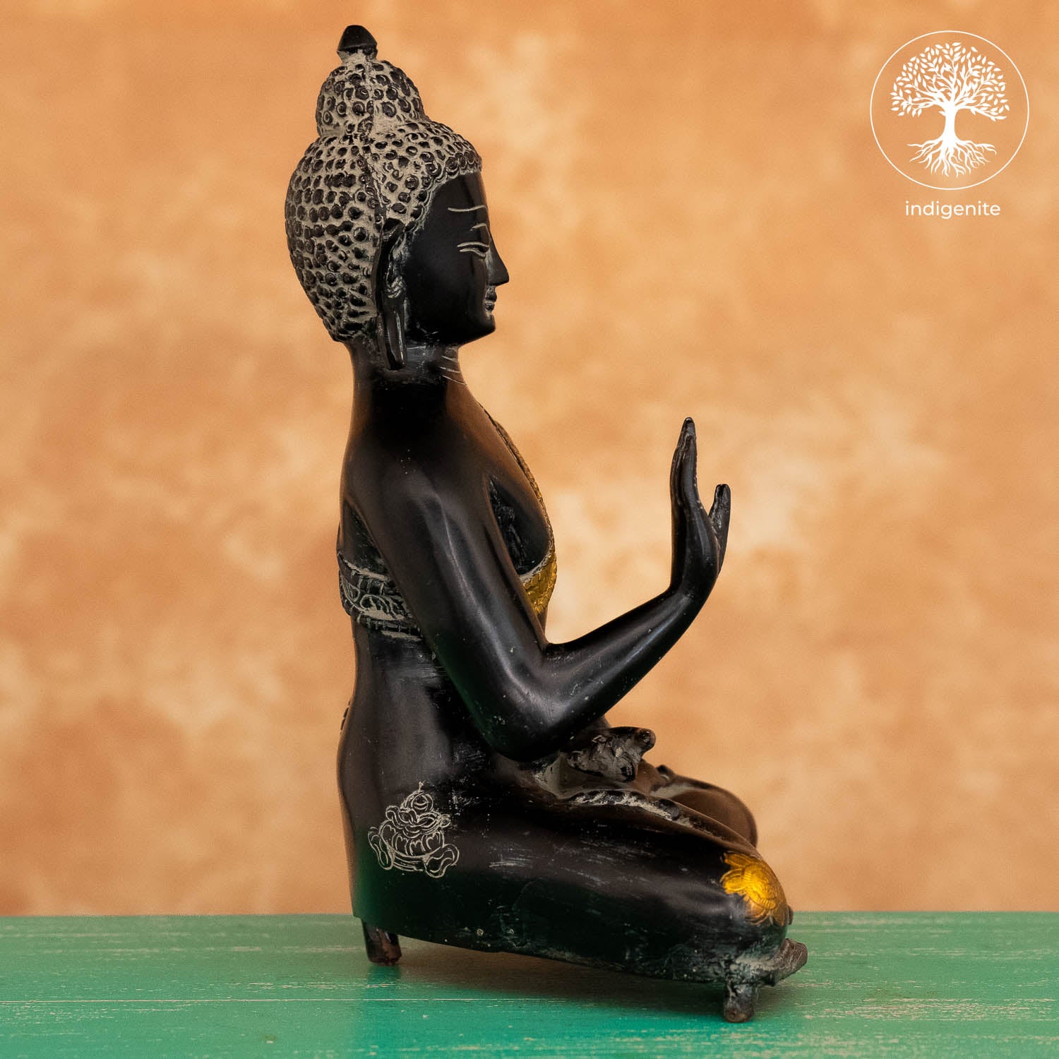 Antique Lord Buddha Sitting In Abhaya Mudra - Brass Statue in Black and Gold Hues