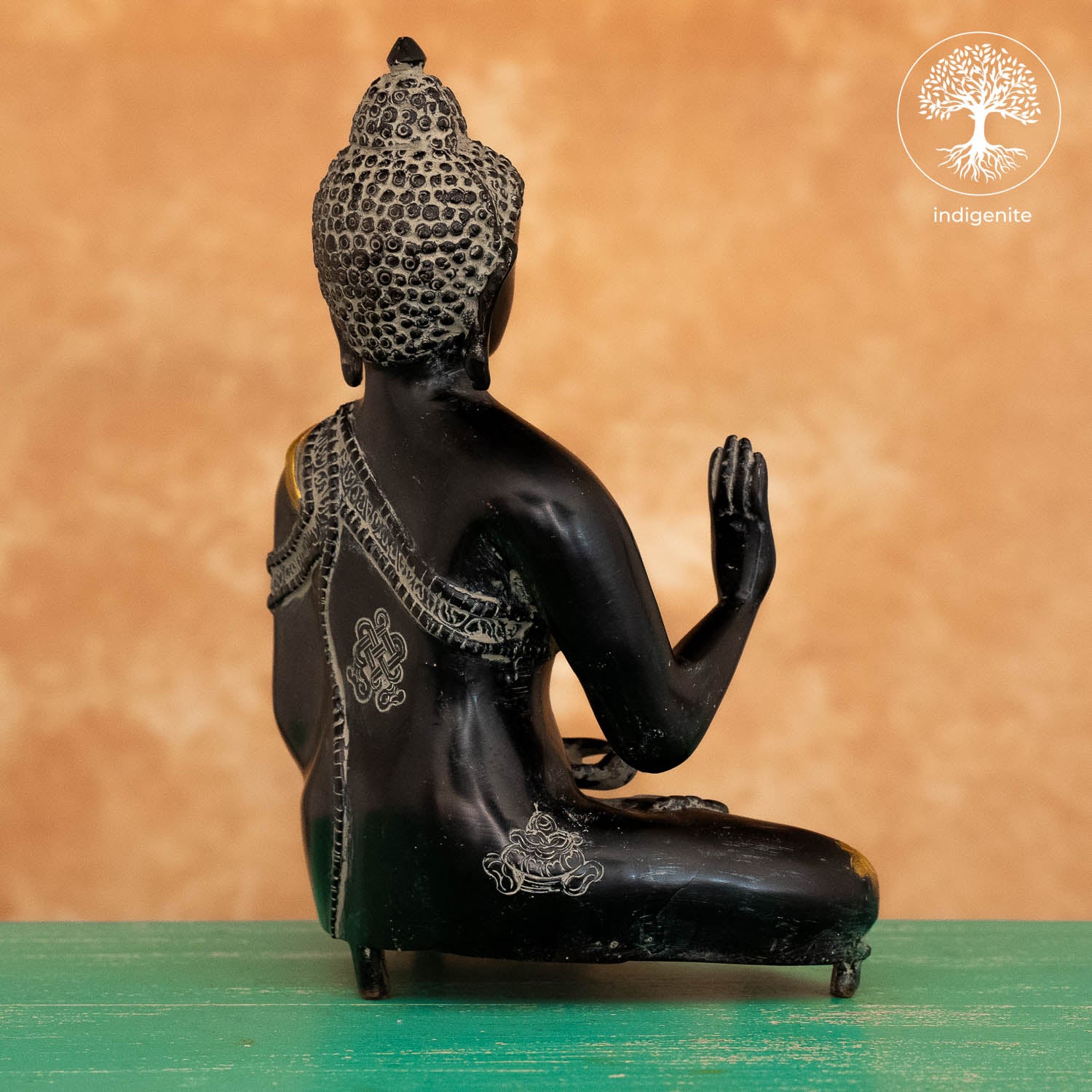 Antique Lord Buddha Sitting In Abhaya Mudra - Brass Statue in Black and Gold Hues