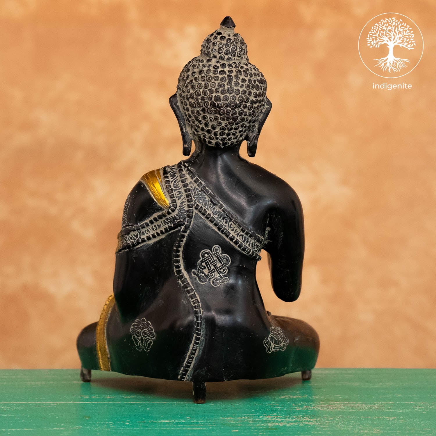 Antique Lord Buddha Sitting In Abhaya Mudra - Brass Statue in Black and Gold Hues