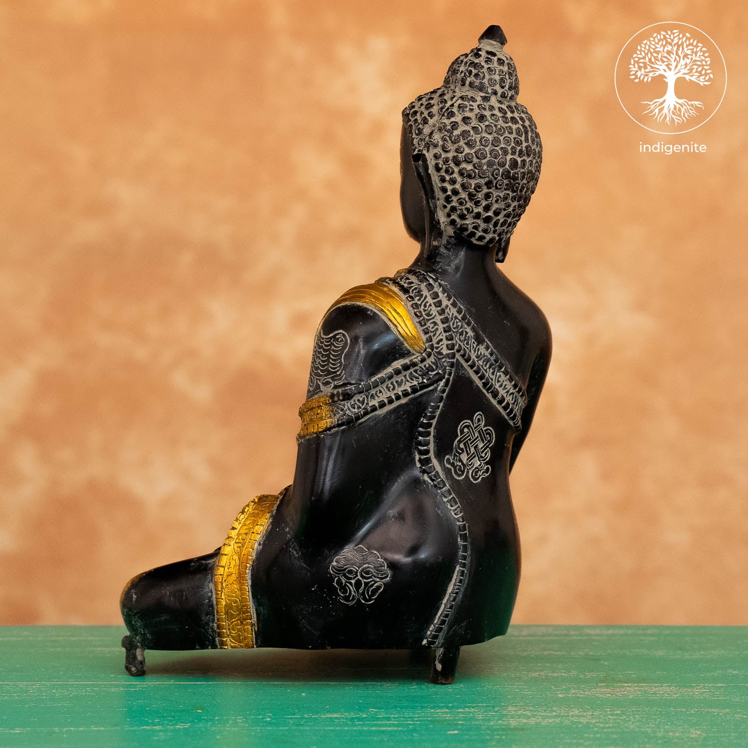 Antique Lord Buddha Sitting In Abhaya Mudra - Brass Statue in Black and Gold Hues
