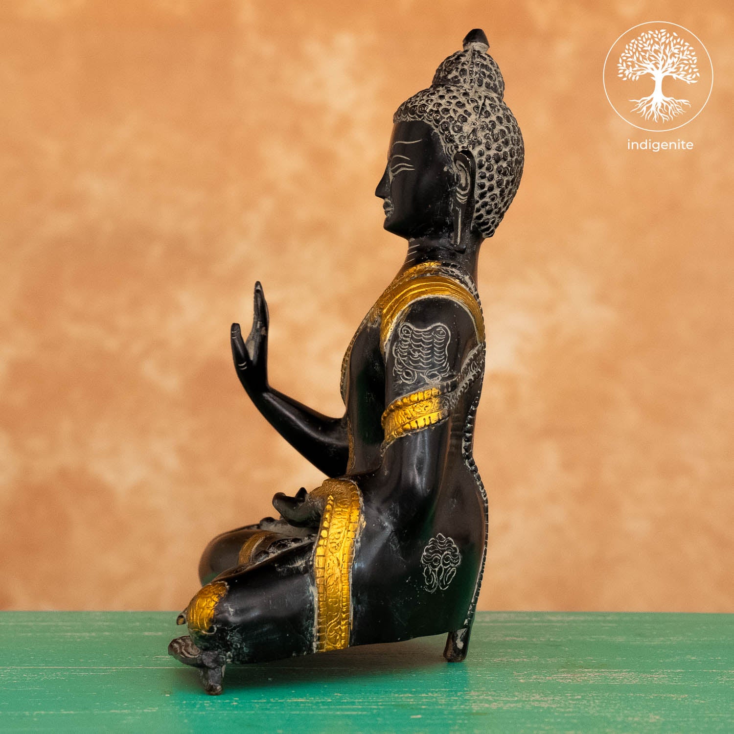 Antique Lord Buddha Sitting In Abhaya Mudra - Brass Statue in Black and Gold Hues