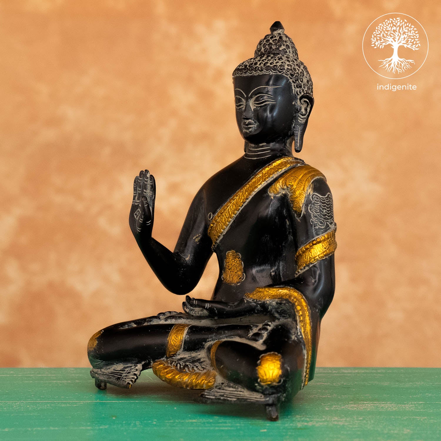 Antique Lord Buddha Sitting In Abhaya Mudra - Brass Statue in Black and Gold Hues