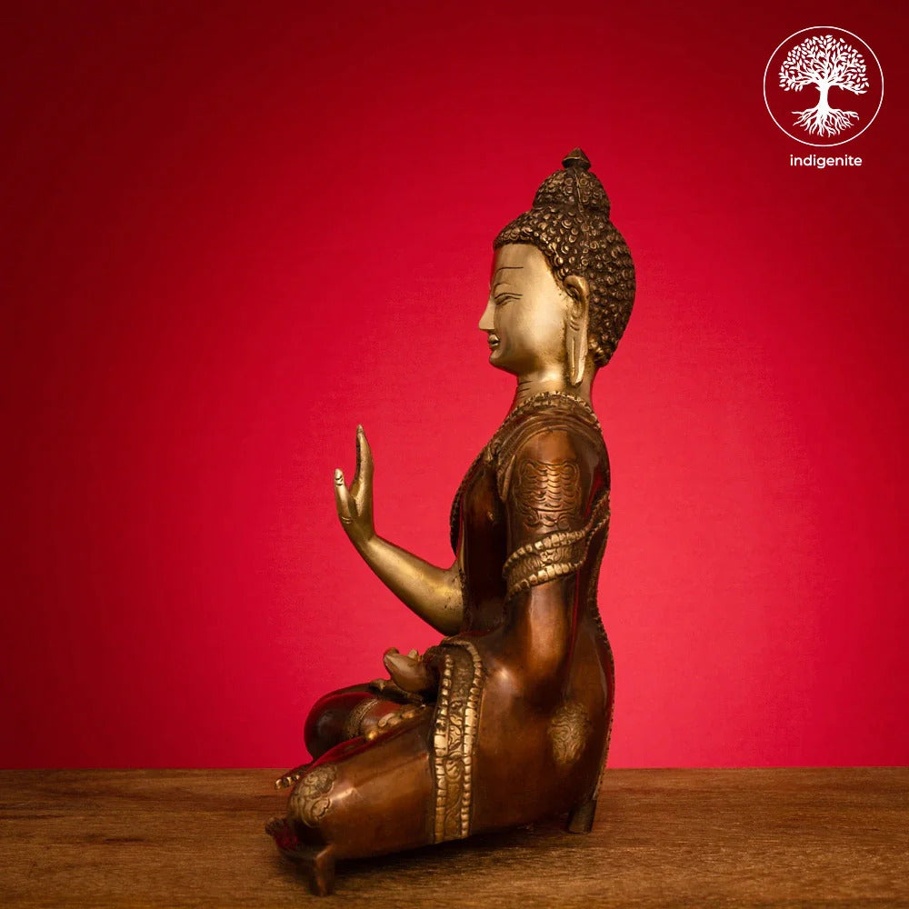 Lord Buddha Idol Sitting in Abhaya Mudra - Brass Statue in Brown and Gold Hues