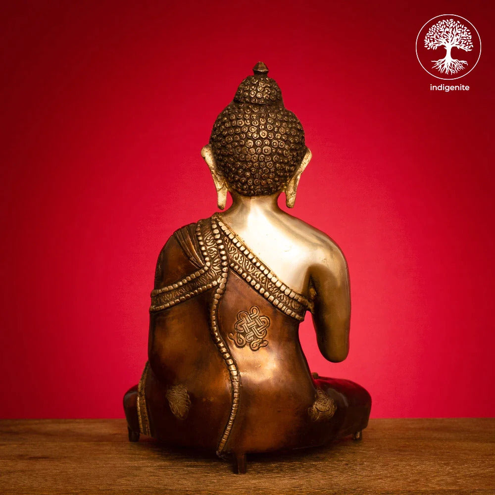 Lord Buddha Idol Sitting in Abhaya Mudra - Brass Statue in Brown and Gold Hues