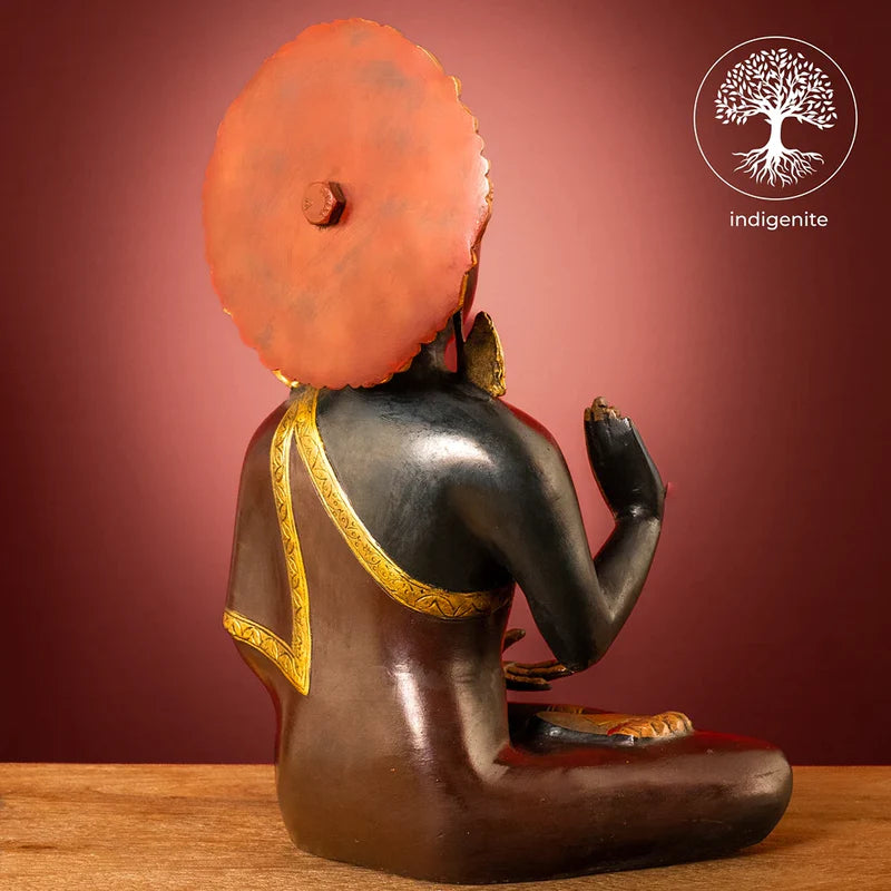 Lord Buddha Sitting In Abhaya Mudra - Brass Statue in Dark Green and Gold Hues