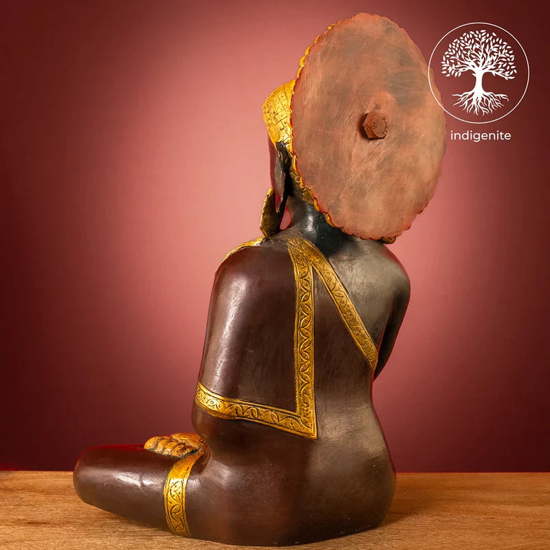 Lord Buddha Sitting In Abhaya Mudra - Brass Statue in Dark Green and Gold Hues