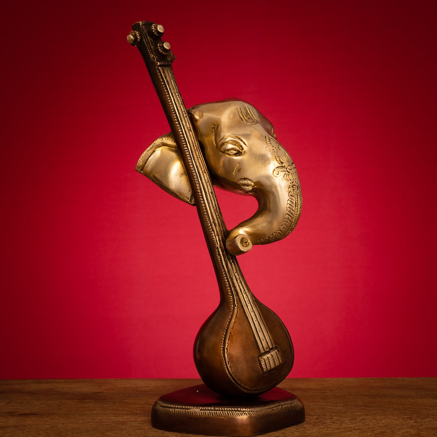 Modern Lord Ganesh Mukh with Veena Idol - Brass Staute in Brown and Gold Hues