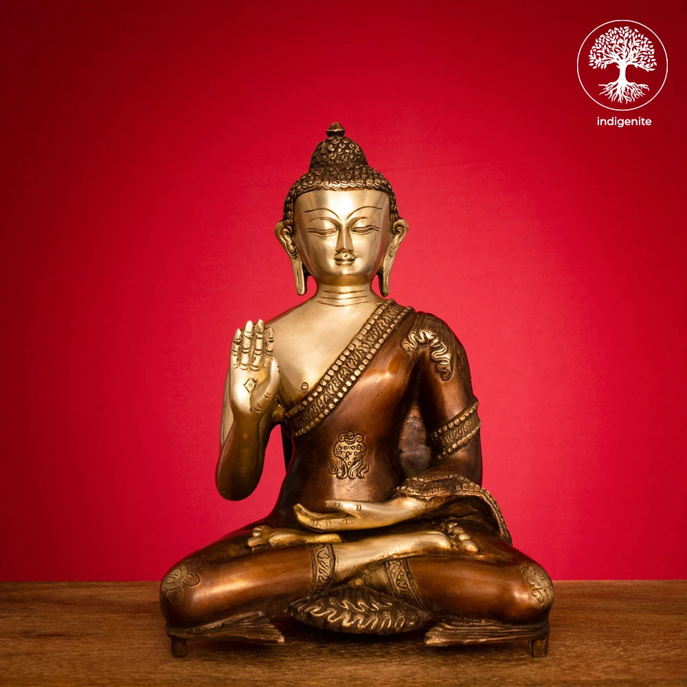 Lord Buddha Idol Sitting in Abhaya Mudra - Brass Statue in Brown and Gold Hues