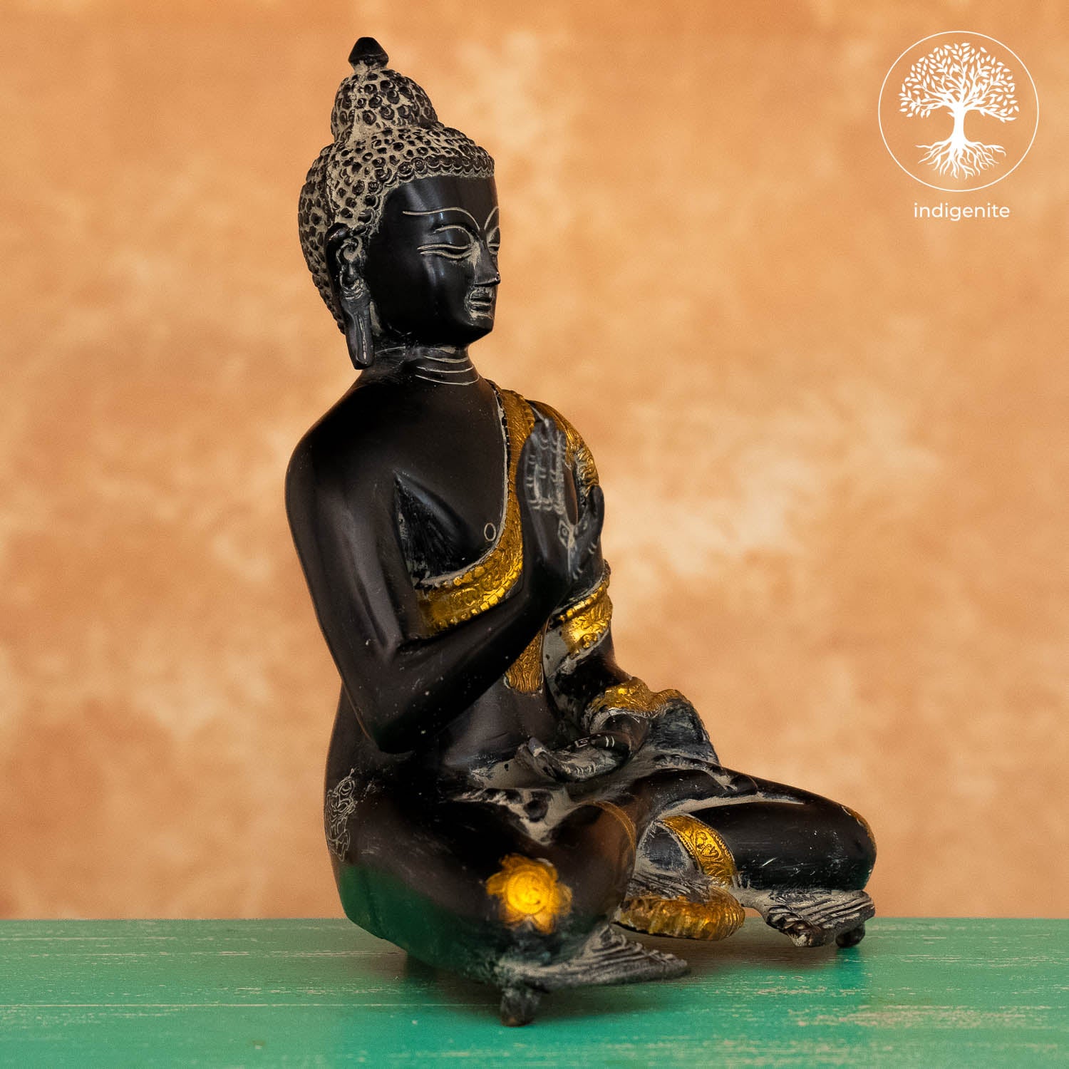 Antique Lord Buddha Sitting In Abhaya Mudra - Brass Statue in Black and Gold Hues