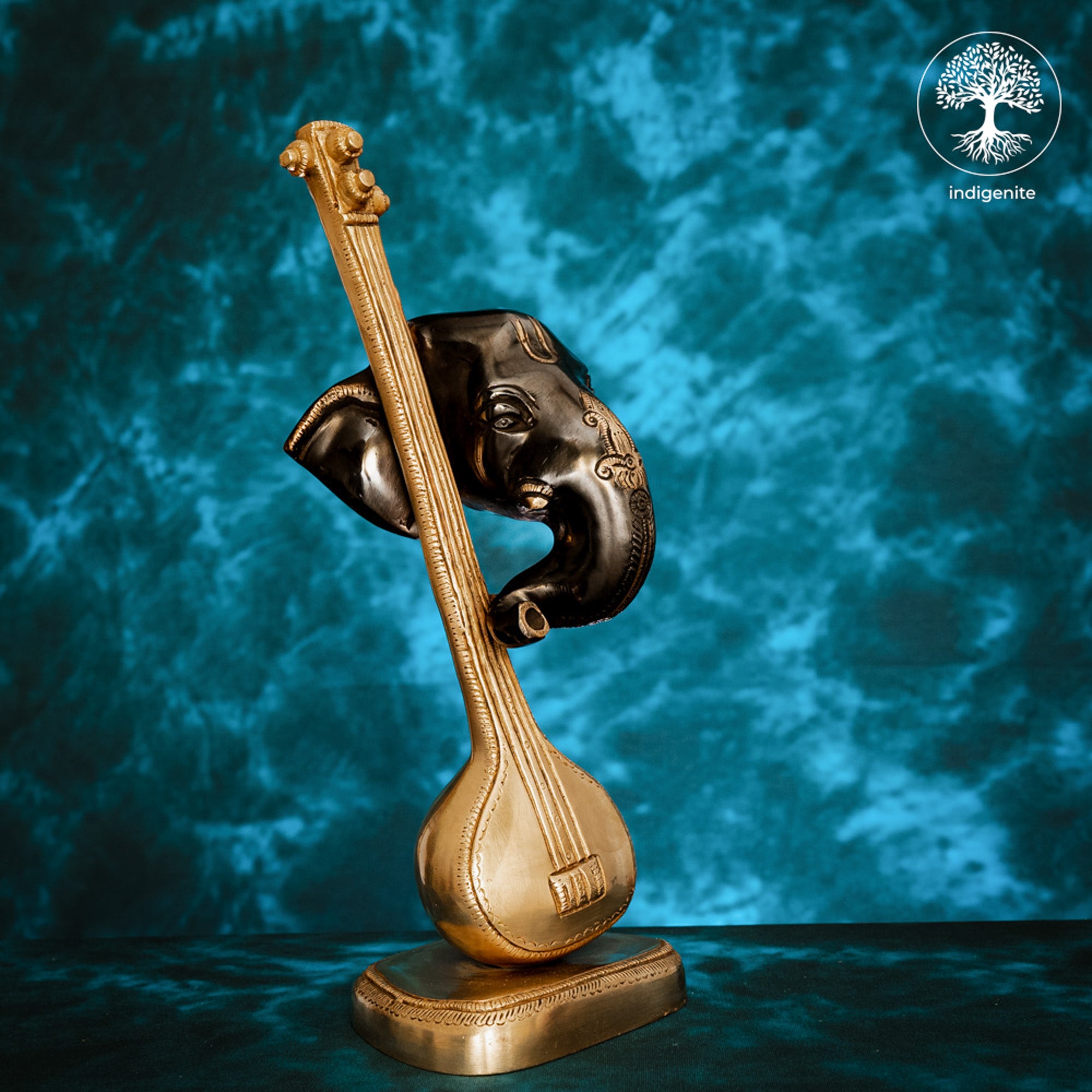 Modern Lord Ganesh Mukh with Veena Idol - Brass Staute in Black and Gold Hues