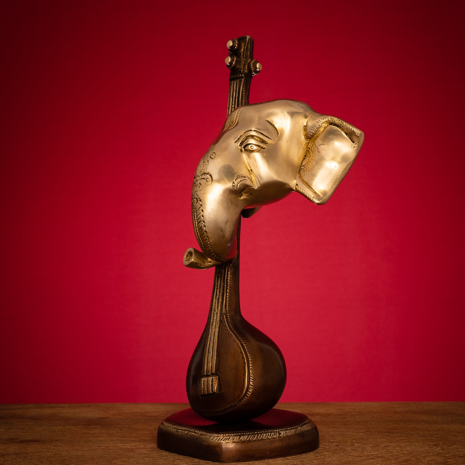 Modern Lord Ganesh Mukh with Veena Idol - Brass Staute in Brown and Gold Hues