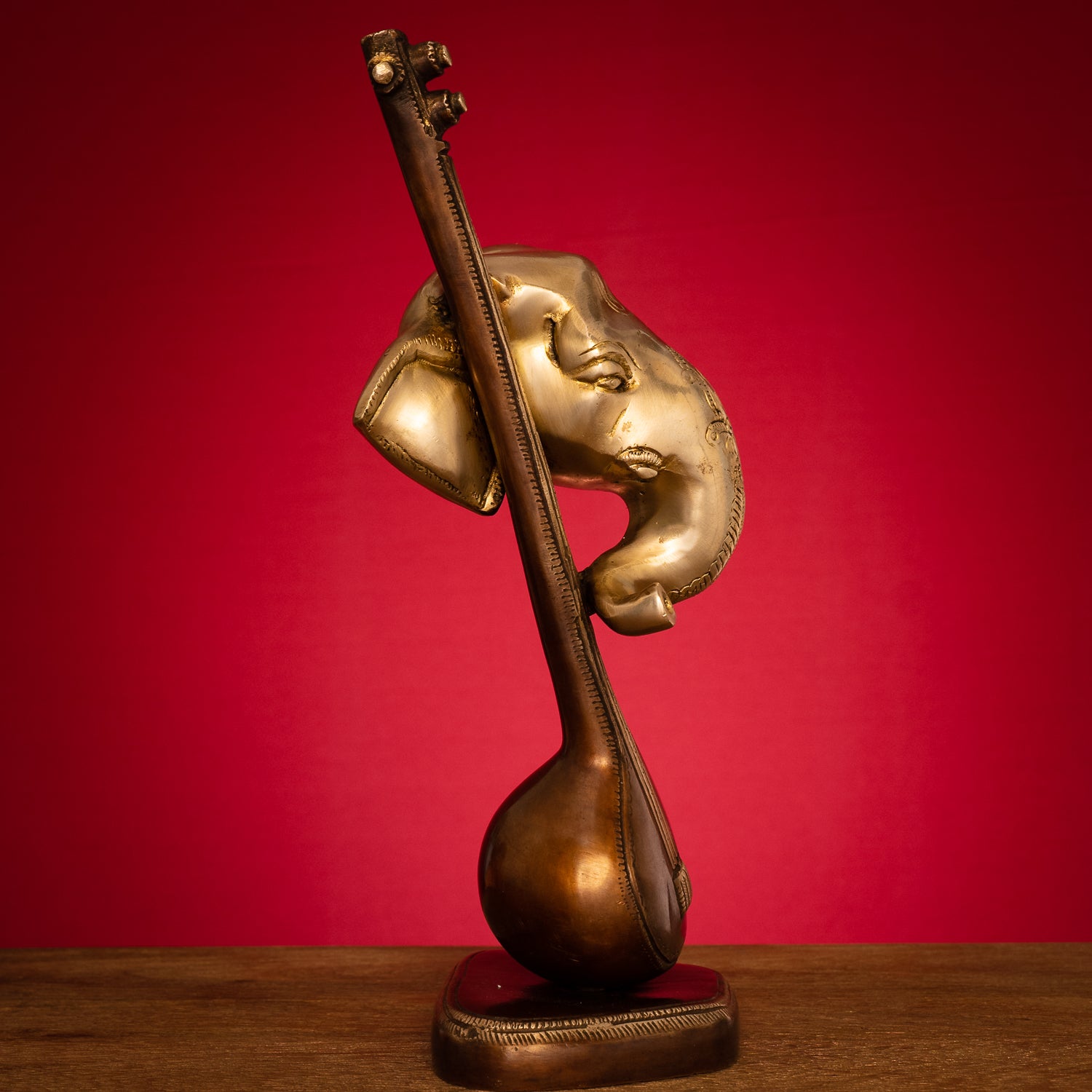 Modern Lord Ganesh Mukh with Veena Idol - Brass Staute in Brown and Gold Hues